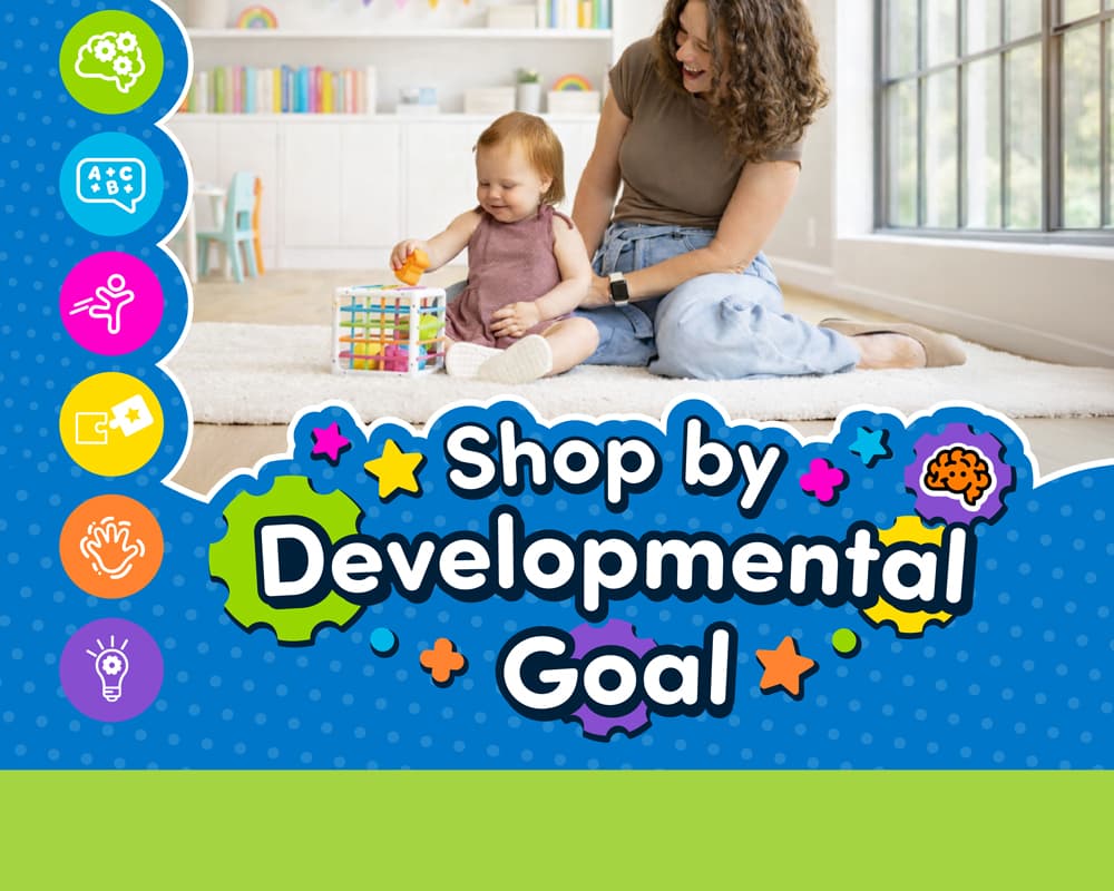 Child looking at the camera playing with Personalized Name Puzzle